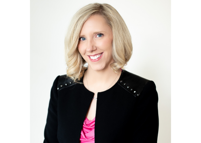 A headshot of Tyson & Mendes partner and head of communications Ashley Paige Fetyko in a black jacket.